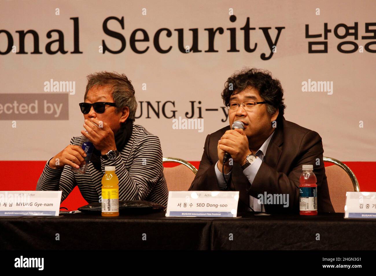 October 6, 2012 - Busan, South Korea : (From lest) Actor Myung Gye Nam and Seo Dong Soo attend their new film `National Security 1985` Gala Presentation event at the CGV Theater. The film based on the memoir of a democracy activist who was tortured in the 1980s by South Korea's military rulers is provoking discussion about the country's not-so-distant authoritarian past and the influence it will have on this year's presidential election. (Ryu Seung-il / Polaris) Stock Photo